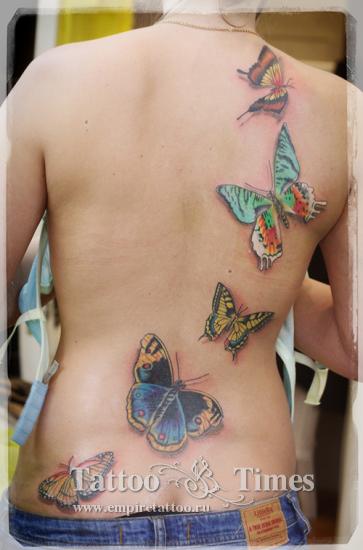 Татуировка бабочка на спине - фото салона Tattoo Times, узнай цену на сайте.