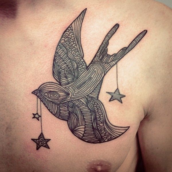Татуировка птица со звездами