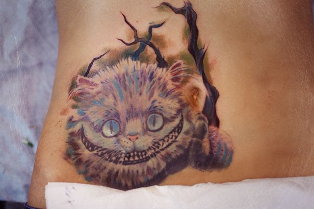 Татуировка чеширского кота