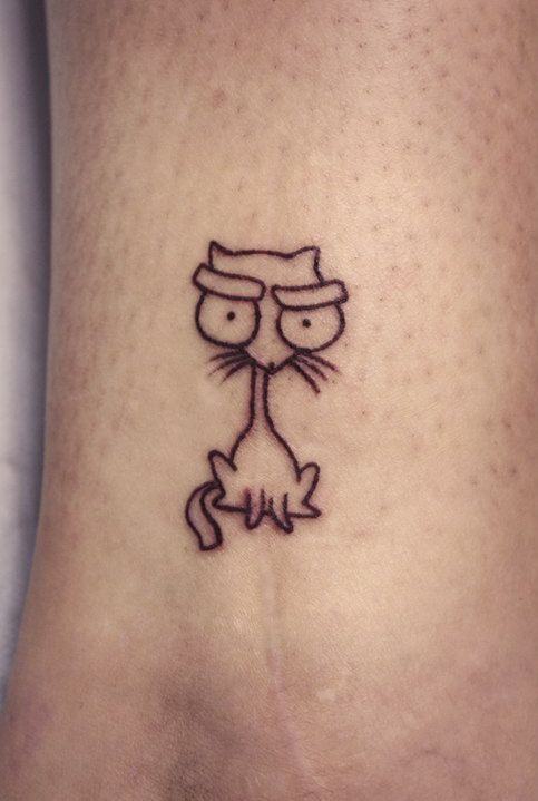 Маленькая татуировка котик