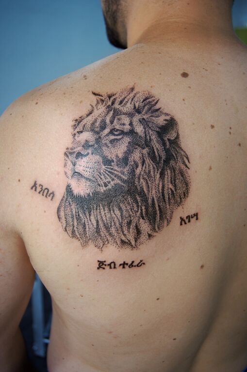 Татуировка лев в дотворке