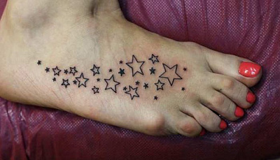 Татуировка звезды на стопе