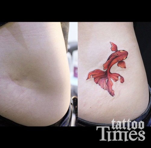 Тату рыбка на шраме
