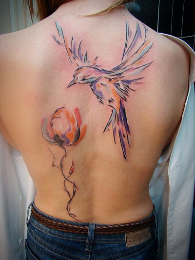Татуировка птица со цветком