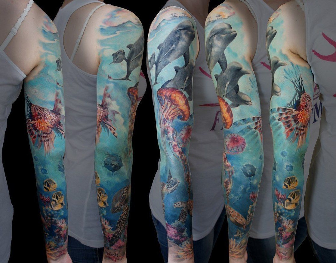 татуировка дельфин