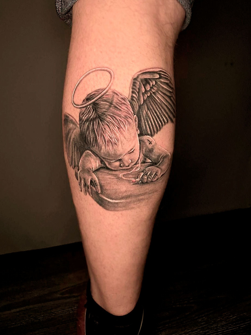 Тату ангел на ноге - фото салона Tattoo Times, узнай цену на сайте.