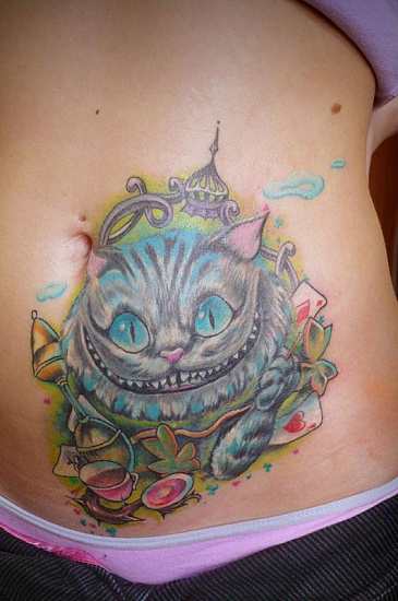 Татуировка чеширский кот на животе