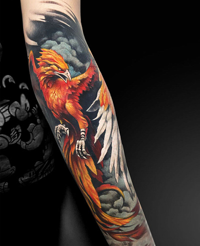 Татуировка феникса на предплечье