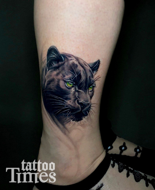 Тату пантера на щиколотке