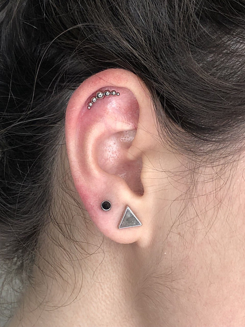 Пирсинг хряща уха 14